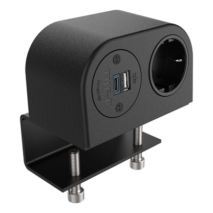 The Single Power Socket with USB Charger - Phase is a black desk-mounted outlet with a clamp, customizable socket apertures, and front panel featuring one power socket plus two USB ports (standard and USB-C).