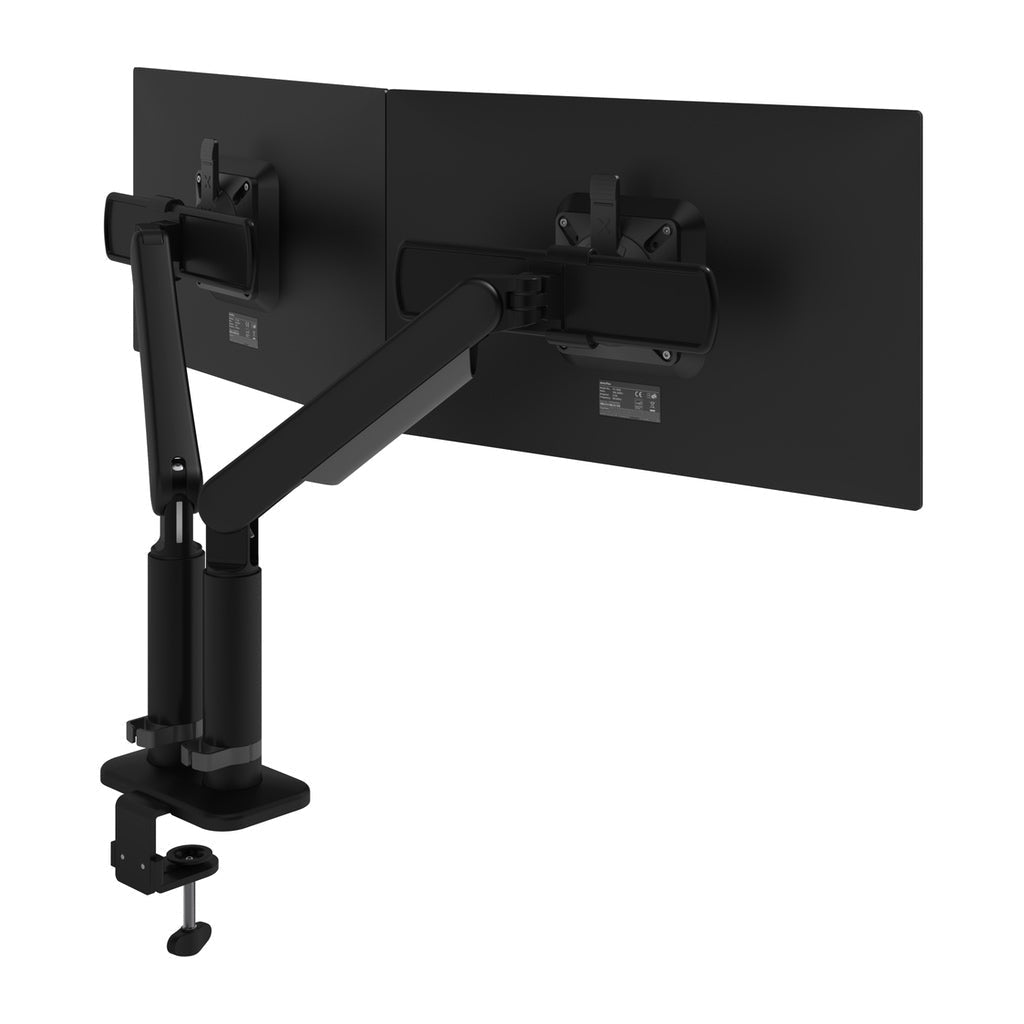 The Monitor arm Viewprime+ Double securely mounts to the desk edge, supporting two flat-screen monitors in landscape orientation. Its adjustable joints and integrated cable management keep your workspace organized. Seen from behind on a white background.