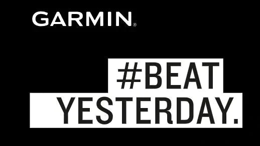 White text on a black background reads GARMIN at the top and #BEAT YESTERDAY. below, with the hashtag and words in bold, emphasizing motivation and improvement.