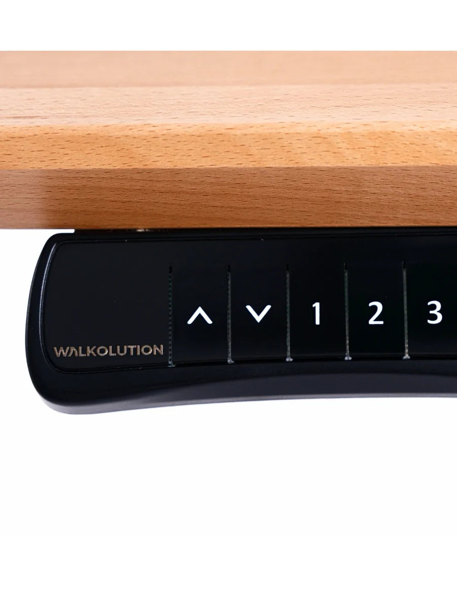 Close-up of the black control panel on the Walkolution Core Desk, positioned under a solid beech wood desktop. The panel includes up and down arrows plus buttons labeled 1, 2, and 3 to adjust the height of this treadmill workstation.