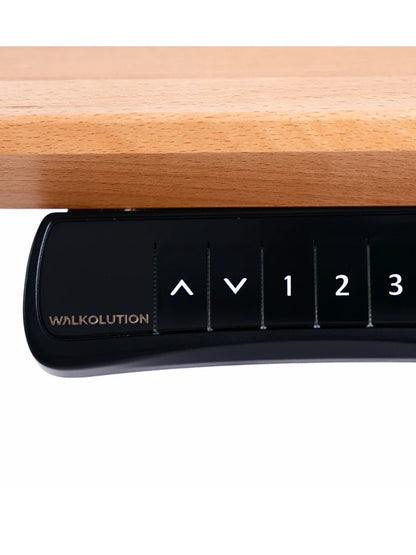 Close-up of the black control panel on the Walkolution Core Desk, positioned under a solid beech wood desktop. The panel includes up and down arrows plus buttons labeled 1, 2, and 3 to adjust the height of this treadmill workstation.