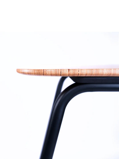 Side view of a modern table with a light wood top and black curved metal legs, ideal as an ergonomic workstation or paired with the Walkolution 1 Desk Attachment for a treadmill desk setup, shown against a white background.