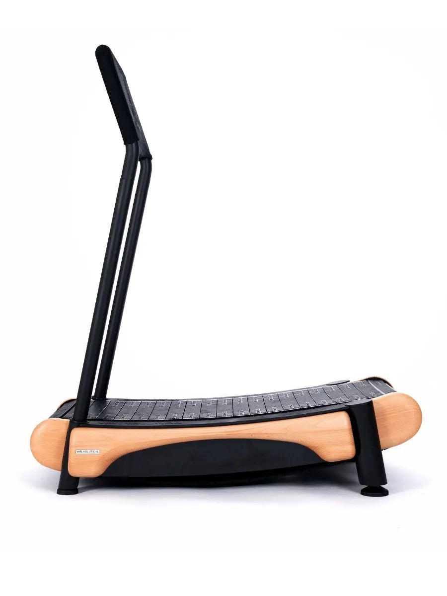 The Walkolution 2 is a curved, manual office treadmill with a wooden frame, black running surface, two upright handles, and a minimalist design—perfect for walking while you work, shown against a white background.