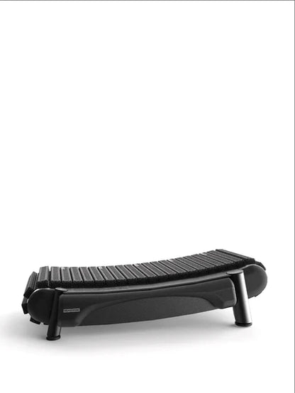 The Walkolution 2—a sleek, black manual office treadmill with a curved running surface and minimalist design—is shown against a white background, making it ideal for walking while you work.