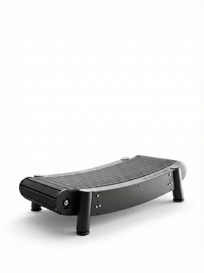 The Walkolution 2 is a modern black manual office treadmill with a curved, minimalist design, no handrails or display, four sturdy legs, and a textured running surface—ideal for walking while you work.