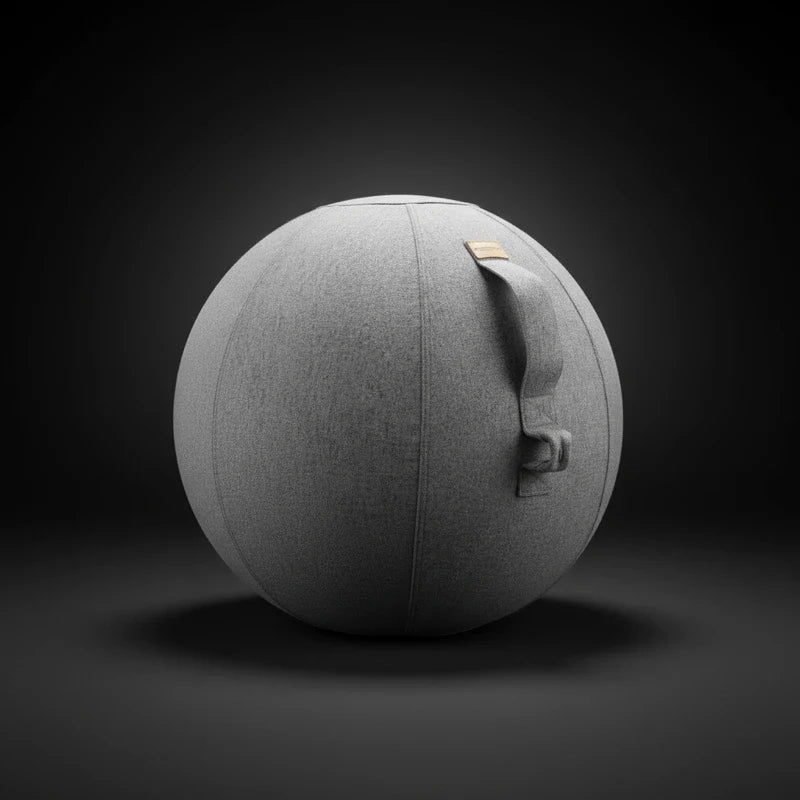 The Walkolution Active Sitting Ball, a gray fabric-covered ergonomic seat with a sturdy side handle, is set against a dark gradient background.