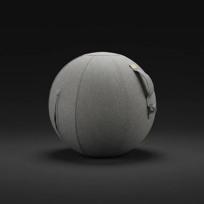 The Walkolution Active Sitting Ball offers ergonomic seating with a gray fabric cover, handle, and zipper pocket—ideal for any space and shown here against a dark background.