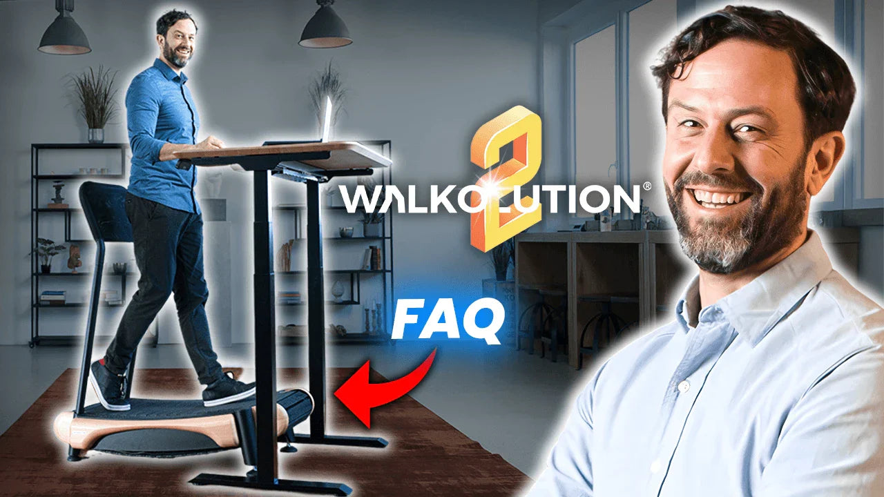 A man smiles at the camera in the foreground, while in the background, he walks on a treadmill desk in a modern office. Text on the image reads “Walkolution 2 FAQ” with a red arrow pointing to the treadmill.