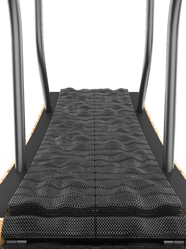 Close-up view of a treadmill, showing the black textured running belt and metallic handrails on both sides against a white background. Walkolution Global