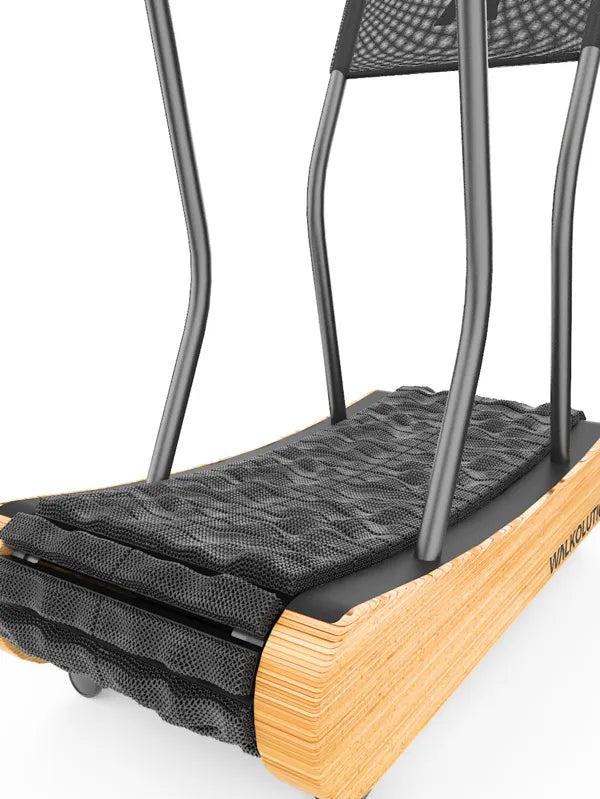 Close-up of a modern treadmill with a curved wooden base and black mesh running surface, featuring black metal handrails. Walkolution Global