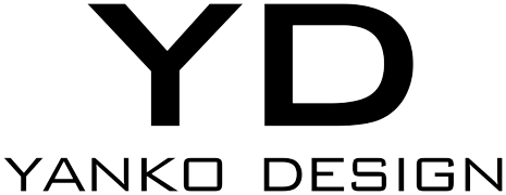The image shows the letters YD in large, bold font, with the words YANKO DESIGN written below in a smaller, modern font. The background is plain and light-colored.
